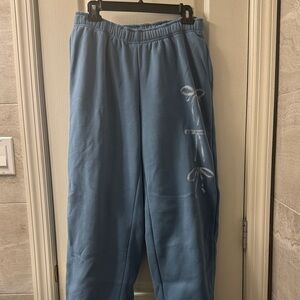Edikted Light Blue Track Pants with White Bow Detail